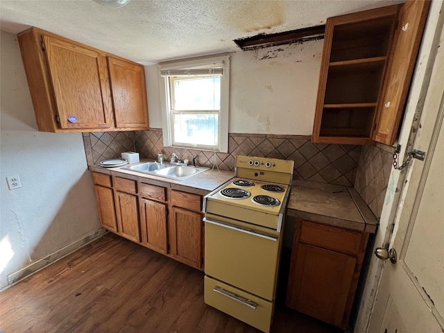 2928 Pine Ave, Waco, TX 76708 - kitchen with white range with electric cooktop, dark wood finished floors, brown cabinetry, open shelves, and a textured ceiling