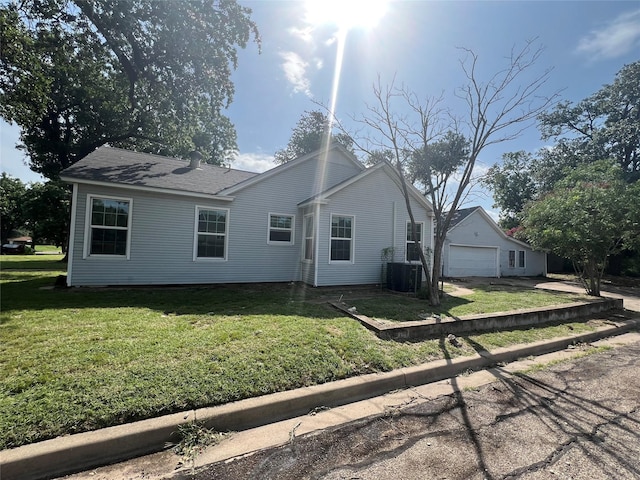 2928 Pine Ave, Waco, TX 76708 - view of front of home featuring a garage, a front yard, and concrete driveway