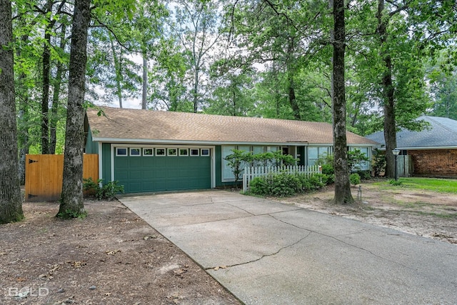 110 Elmview Ln, Haughton, LA 71037 - single story home with an attached garage, a fenced front yard, and driveway
