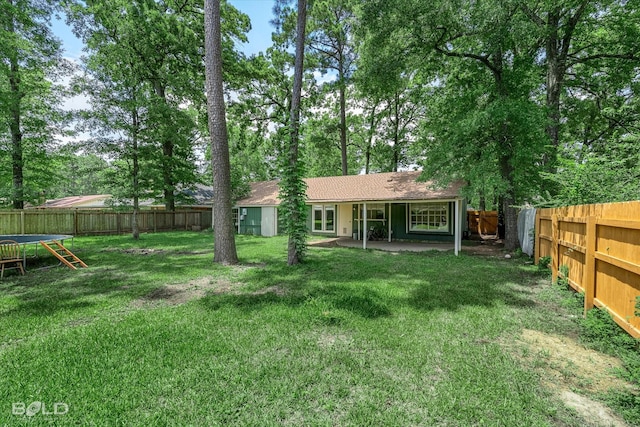 110 Elmview Ln, Haughton, LA 71037 - rear view of house with a fenced backyard and a patio area
