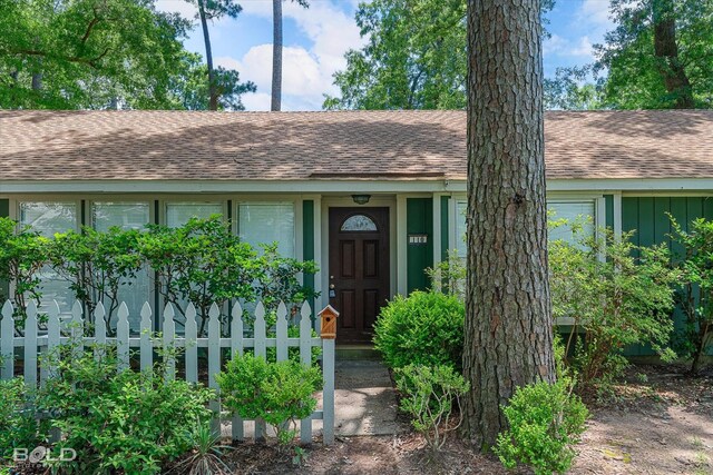 110 Elmview Ln, Haughton, LA 71037 - view of exterior entry featuring a shingled roof