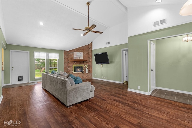 110 Elmview Ln, Haughton, LA 71037 - living room with ceiling fan, a brick fireplace, wood finished floors, and high vaulted ceiling
