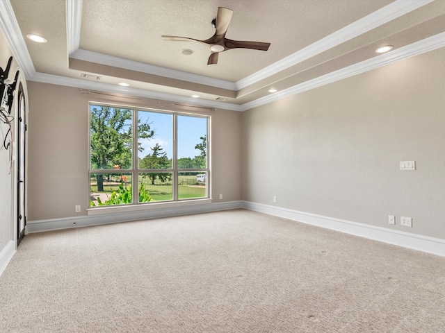 830 Cemetery Rd, Decatur, TX 76234 - spare room with ornamental molding, a raised ceiling, carpet floors, ceiling fan, and recessed lighting