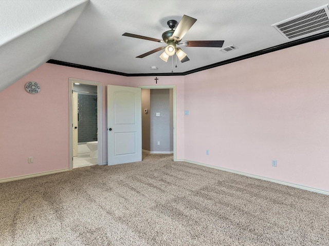 830 Cemetery Rd, Decatur, TX 76234 - unfurnished bedroom with carpet, vaulted ceiling, ensuite bath, crown molding, and a ceiling fan