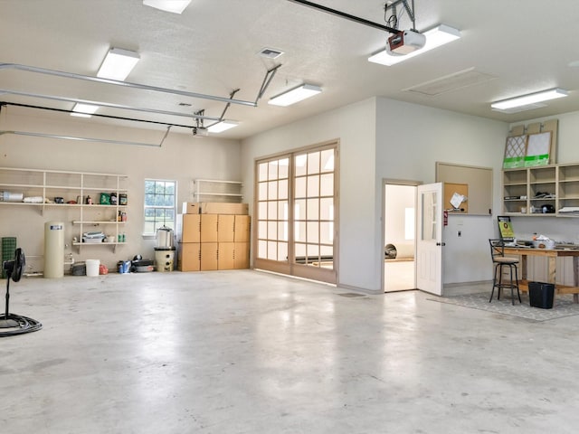830 Cemetery Rd, Decatur, TX 76234 - garage with a garage door opener