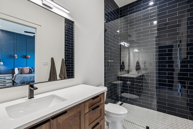 1890 Mcconnell Rd, Gunter, TX 75058 - bathroom with vanity, ensuite bathroom, and tiled shower