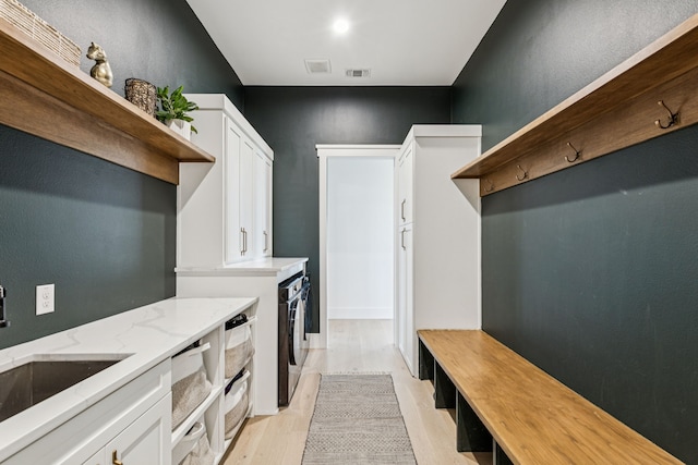 1890 Mcconnell Rd, Gunter, TX 75058 - mudroom featuring a sink and light wood finished floors