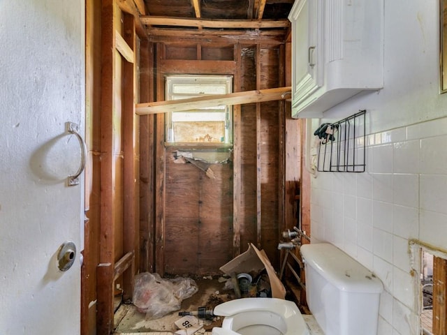 1405 NE 37th St, Fort Worth, TX 76106 - half bathroom with toilet and tile walls