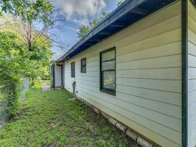 1405 NE 37th St, Fort Worth, TX 76106 - view of home's exterior featuring a lawn