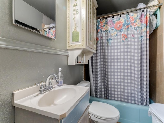 1405 NE 37th St, Fort Worth, TX 76106 - full bath featuring vanity, shower / bathtub combination with curtain, and a textured wall