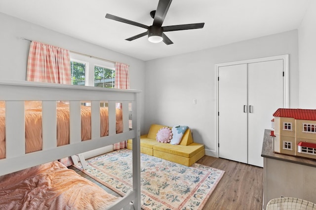 1204 Maxfield St, Bellmead, TX 76705 - bedroom with wood finished floors, a closet, and ceiling fan