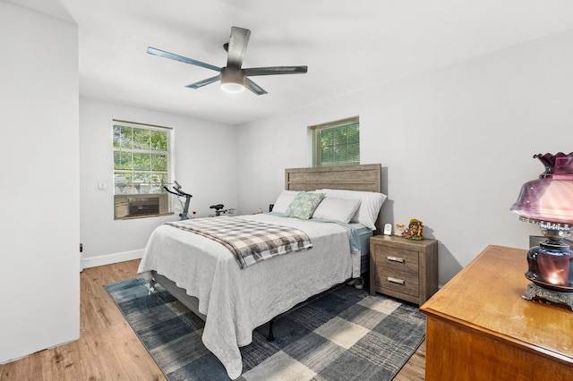 1204 Maxfield St, Bellmead, TX 76705 - bedroom featuring light wood-style flooring and a ceiling fan