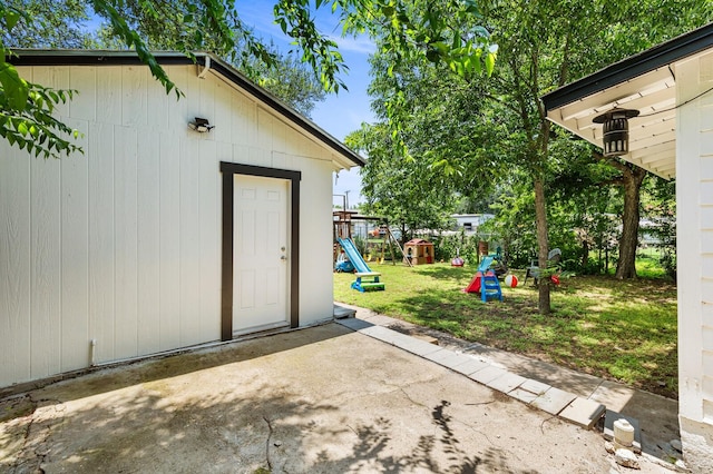 1204 Maxfield St, Bellmead, TX 76705 - view of patio / terrace with a playground and an outdoor structure
