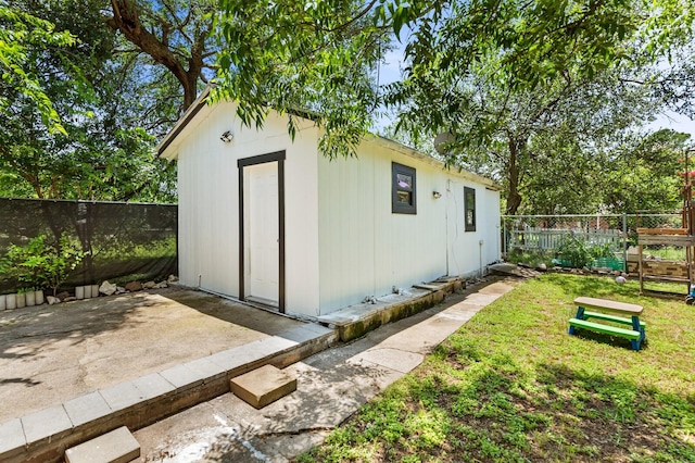 1204 Maxfield St, Bellmead, TX 76705 - view of outdoor structure with a fenced backyard