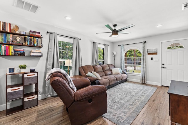 1204 Maxfield St, Bellmead, TX 76705 - living area featuring ceiling fan, plenty of natural light, wood finished floors, and recessed lighting