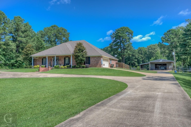 133 Downs Dr, Benton, LA 71006 - ranch-style home with a carport, a porch, curved driveway, brick siding, and a garage