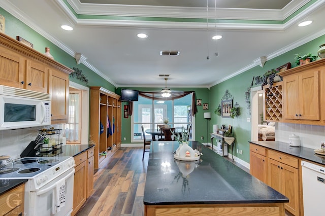 133 Downs Dr, Benton, LA 71006 - kitchen featuring white appliances, dark countertops, ornamental molding, decorative backsplash, and a ceiling fan