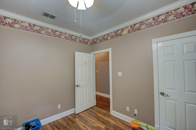 133 Downs Dr, Benton, LA 71006 - empty room featuring wood finished floors and crown molding
