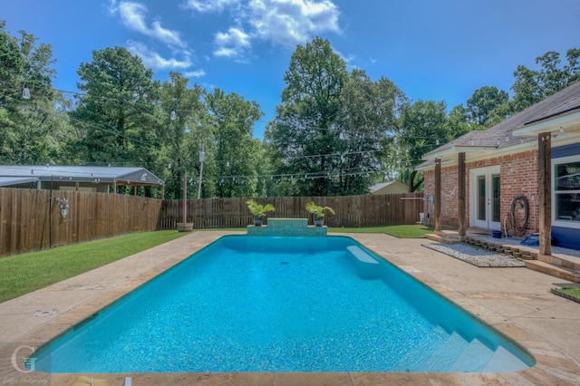 133 Downs Dr, Benton, LA 71006 - view of swimming pool featuring french doors, a patio area, and a fenced backyard