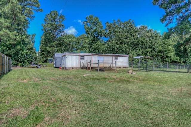 133 Downs Dr, Benton, LA 71006 - view of yard with an outbuilding