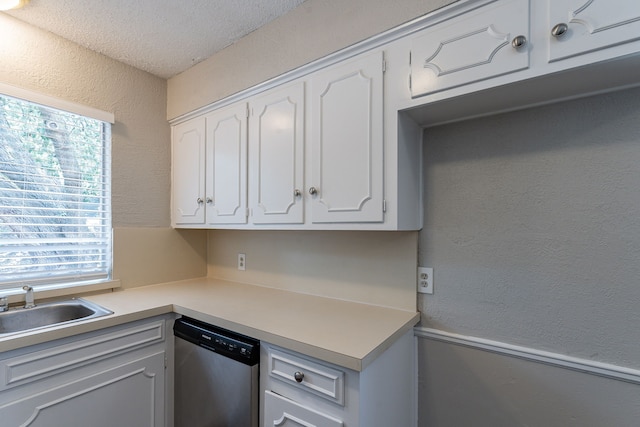5209 Wolens Way, Fort Worth, TX 76133 - kitchen featuring dishwasher, plenty of natural light, white cabinets, light countertops, and a textured wall