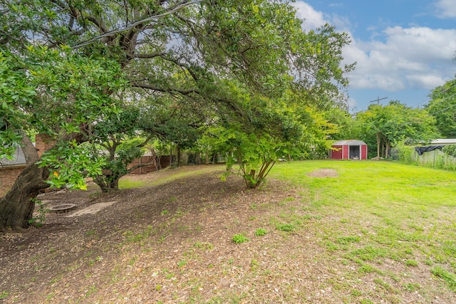 5209 Wolens Way, Fort Worth, TX 76133 - view of green lawn with a shed