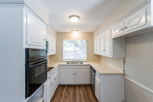 5209 Wolens Way, Fort Worth, TX 76133 - kitchen with black appliances, white cabinetry, a textured ceiling, light countertops, and dark wood-style flooring