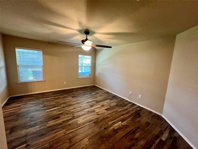 484 Harding Ln, Lavon, TX 75166 - unfurnished room featuring dark wood-style flooring, a ceiling fan, and a textured ceiling