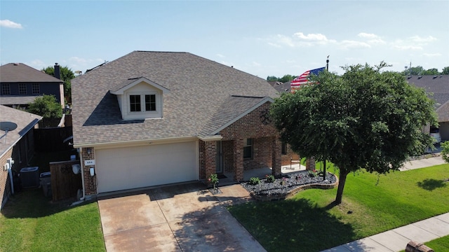 484 Harding Ln, Lavon, TX 75166 - view of front of property with brick siding, roof with shingles, concrete driveway, and a front lawn