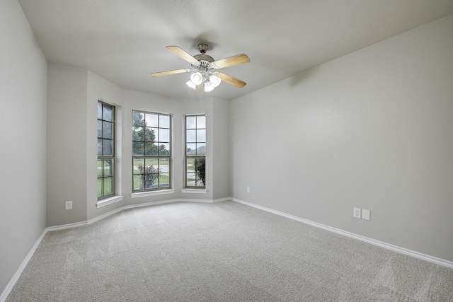 11440 Mitchell Cir, Ponder, TX 76259 - unfurnished room with carpet flooring and a ceiling fan