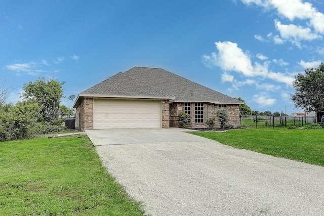 11440 Mitchell Cir, Ponder, TX 76259 - view of front facade featuring brick siding, concrete driveway, an attached garage, and roof with shingles
