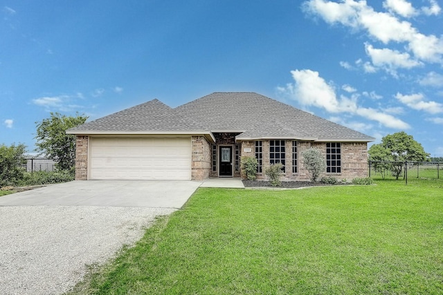 11440 Mitchell Cir, Ponder, TX 76259 - view of front of property with driveway, a garage, roof with shingles, and brick siding