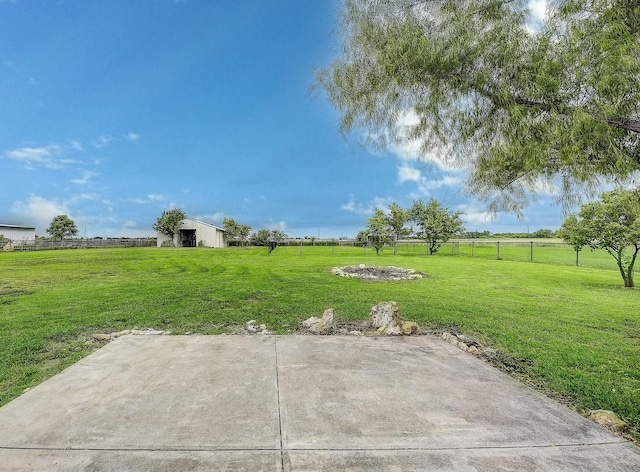 11440 Mitchell Cir, Ponder, TX 76259 - view of yard featuring a view of rural / pastoral area, an outdoor structure, an outbuilding, and a patio area