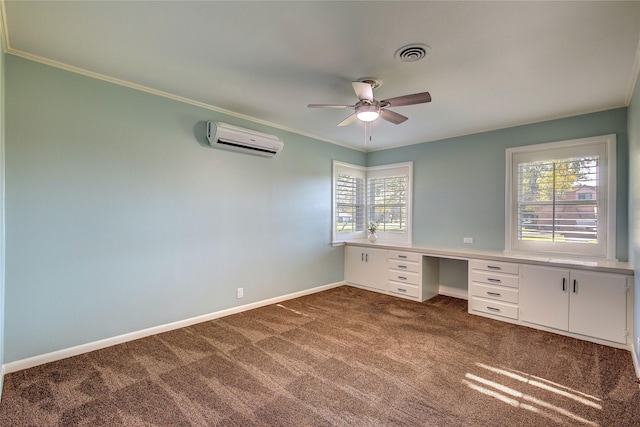 1521 Church St, Sulphur Springs, TX 75482 - unfurnished office featuring a wall mounted AC, dark carpet, ceiling fan, built in desk, and crown molding