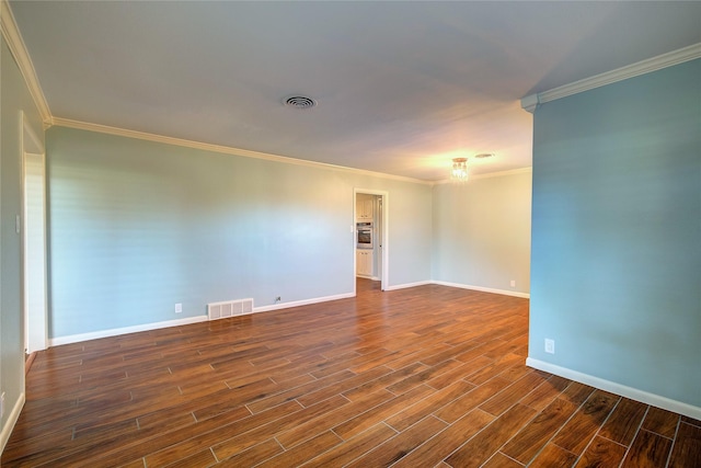 1521 Church St, Sulphur Springs, TX 75482 - empty room with ornamental molding and dark wood-style floors