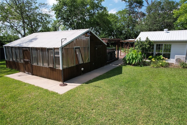 1521 Church St, Sulphur Springs, TX 75482 - back of property with a metal roof and a yard