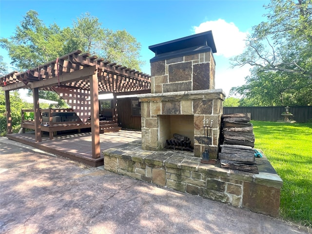 1521 Church St, Sulphur Springs, TX 75482 - view of patio / terrace featuring an outdoor stone fireplace, a pergola, and a deck