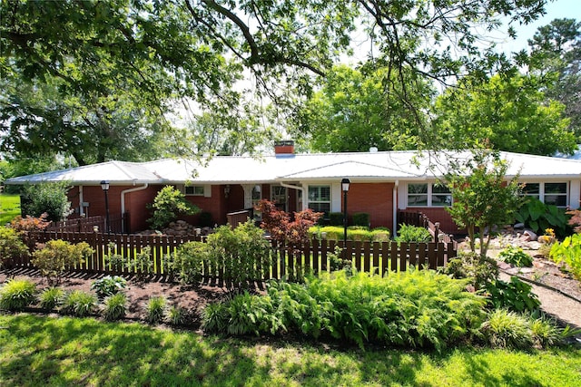 1521 Church St, Sulphur Springs, TX 75482 - ranch-style house with brick siding and a chimney