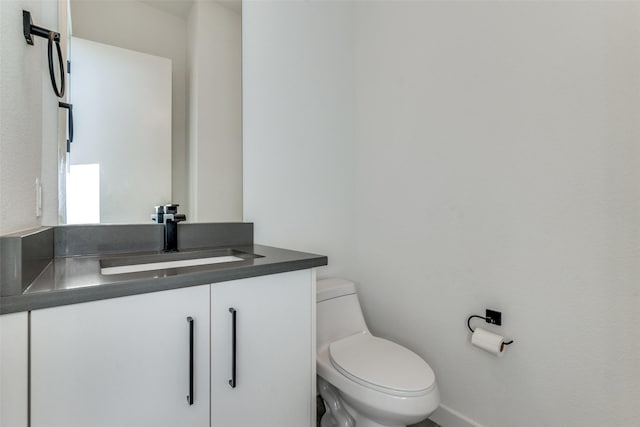 1901 N Carroll Ave Unit 104, Dallas, TX 75204 - bathroom featuring toilet and vanity