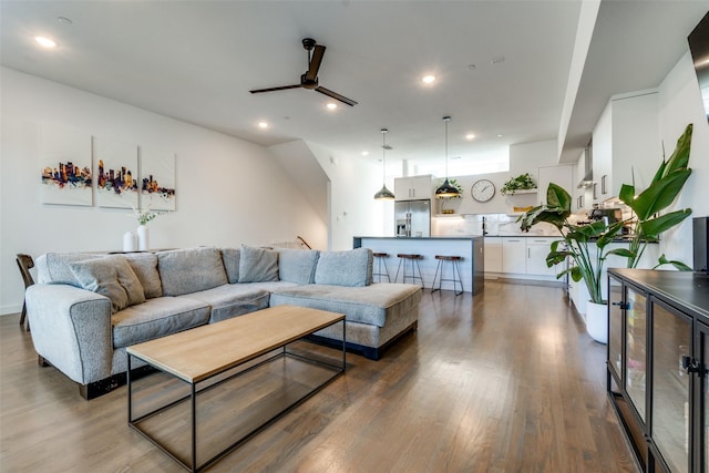 1901 N Carroll Ave Unit 104, Dallas, TX 75204 - living room featuring ceiling fan, recessed lighting, wood finished floors, and beverage cooler