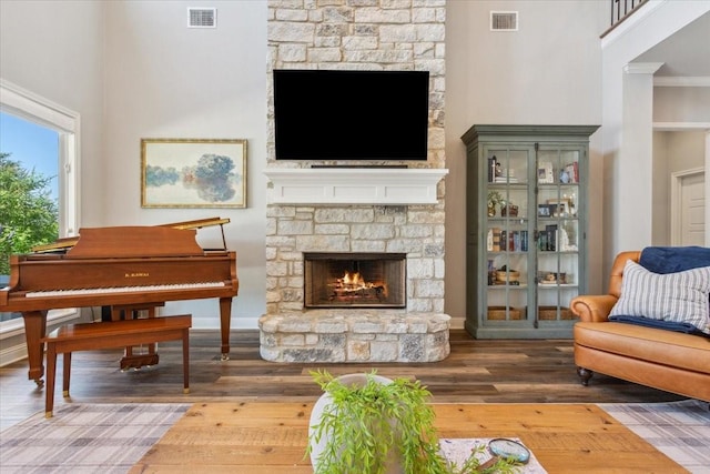 400 Wycliff Dr, China Spring, TX 76633 - sitting room with a stone fireplace and wood finished floors