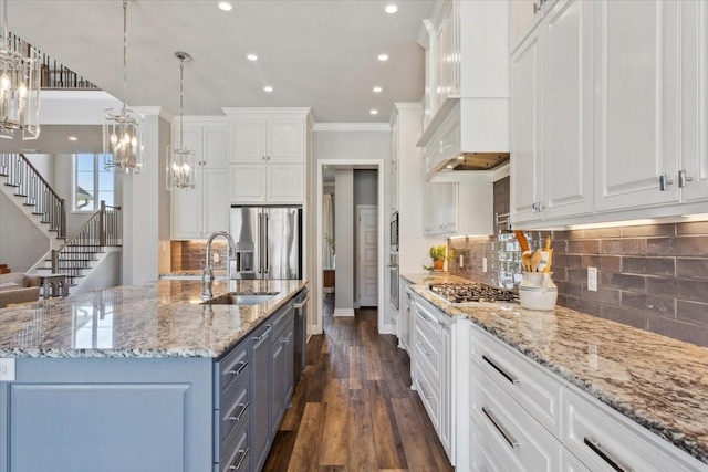 400 Wycliff Dr, China Spring, TX 76633 - kitchen featuring stainless steel appliances, crown molding, white cabinetry, custom exhaust hood, and dark wood-style flooring