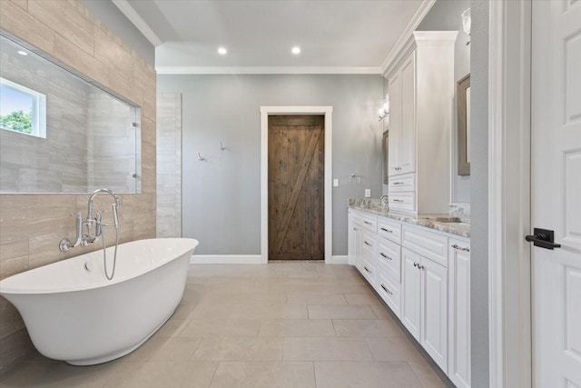 400 Wycliff Dr, China Spring, TX 76633 - full bath with double vanity, a freestanding tub, crown molding, recessed lighting, and tile patterned flooring