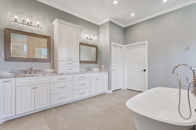 400 Wycliff Dr, China Spring, TX 76633 - full bath with double vanity, a soaking tub, ornamental molding, and recessed lighting