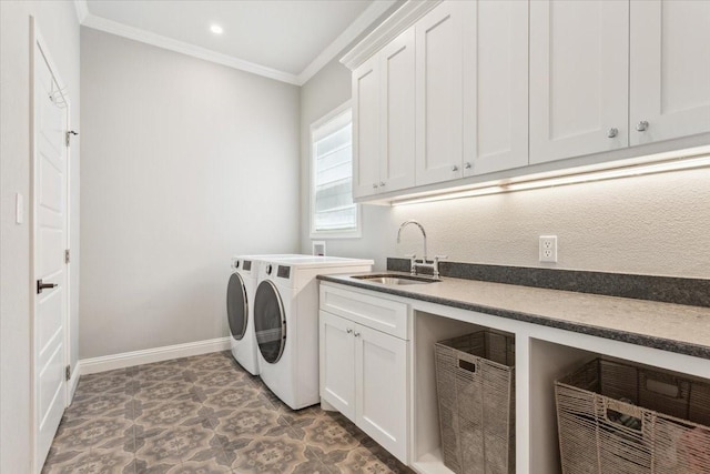 400 Wycliff Dr, China Spring, TX 76633 - washroom featuring separate washer and dryer, ornamental molding, and cabinet space