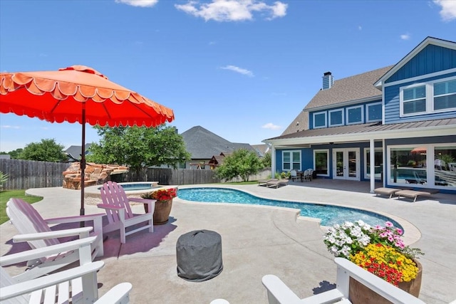 400 Wycliff Dr, China Spring, TX 76633 - view of pool with french doors, a fenced backyard, an in-ground hot tub, and a patio area