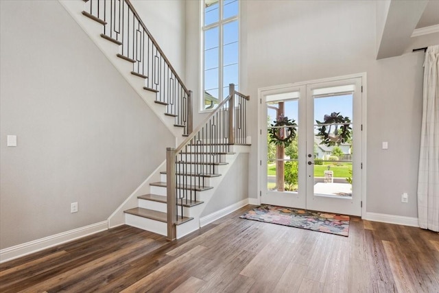 400 Wycliff Dr, China Spring, TX 76633 - entrance foyer with wood finished floors, french doors, stairs, and a high ceiling