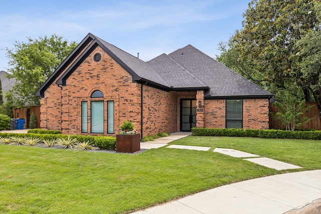 7306 Hiddencreek Dr, Dallas, TX 75252 - view of front of home with brick siding and roof with shingles