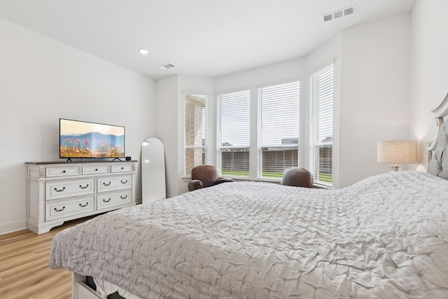 1814 Cypress Gap Trl, Mansfield, TX 76063 - bedroom featuring multiple windows, light wood finished floors, and recessed lighting