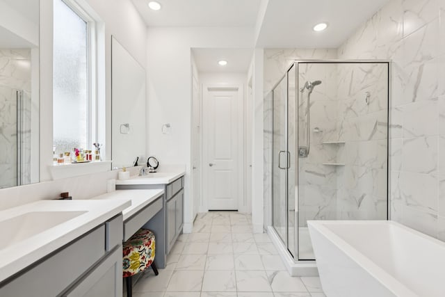 1814 Cypress Gap Trl, Mansfield, TX 76063 - full bath with marble look tile flooring, vanity, a marble finish shower, recessed lighting, and a freestanding tub